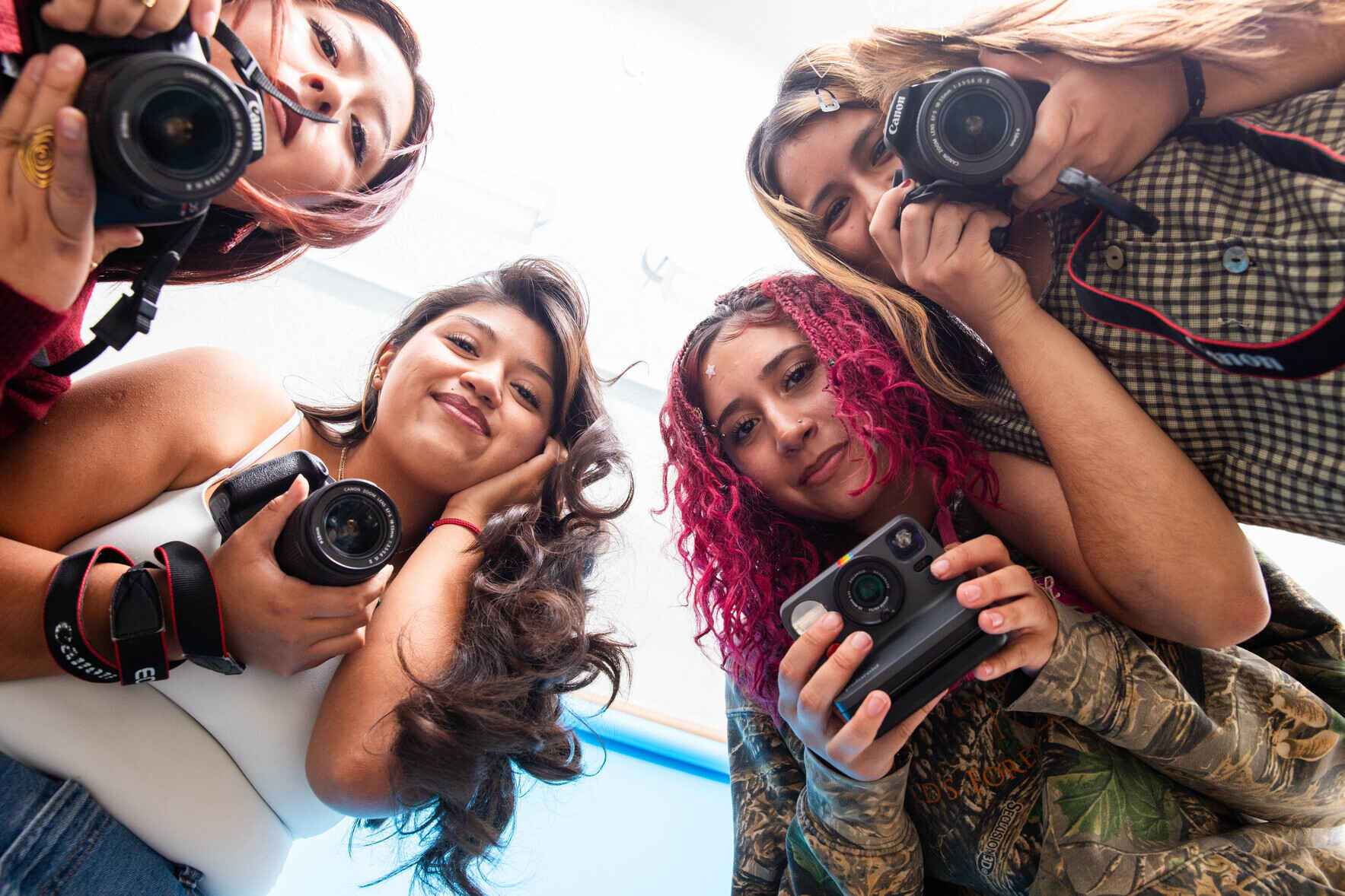 Invest in Las Fotos Project. Uplift Youth Voice. image