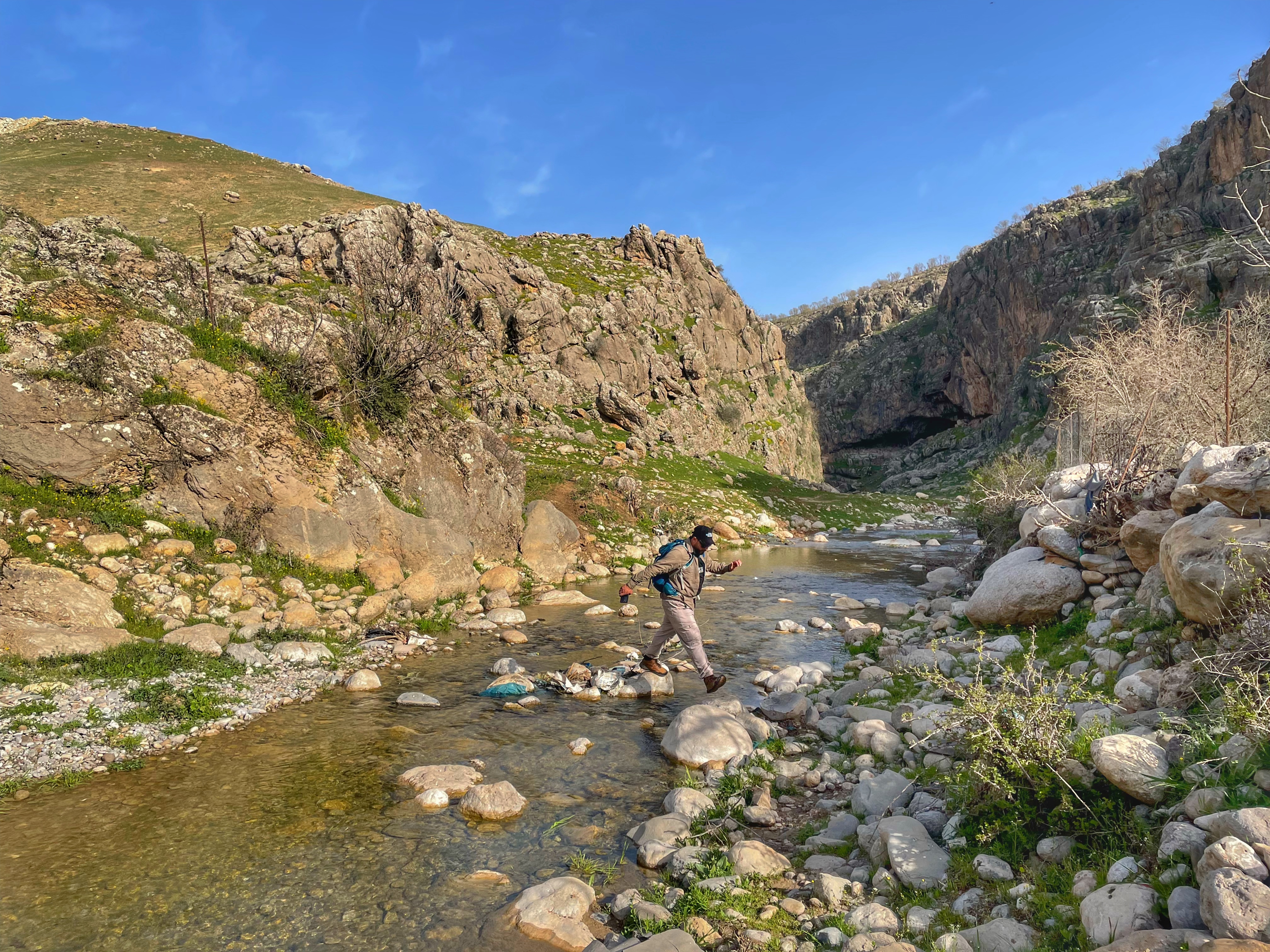 Lawin Mohammad crossing a stream south of Rwanduz | Photo by Leon McCarron 